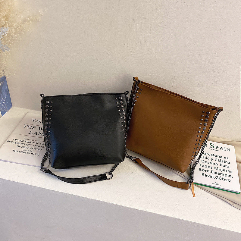 Winter new female bag retro style large capacity one-shoulder bucket bag soft leather rivet messenger bag mySite