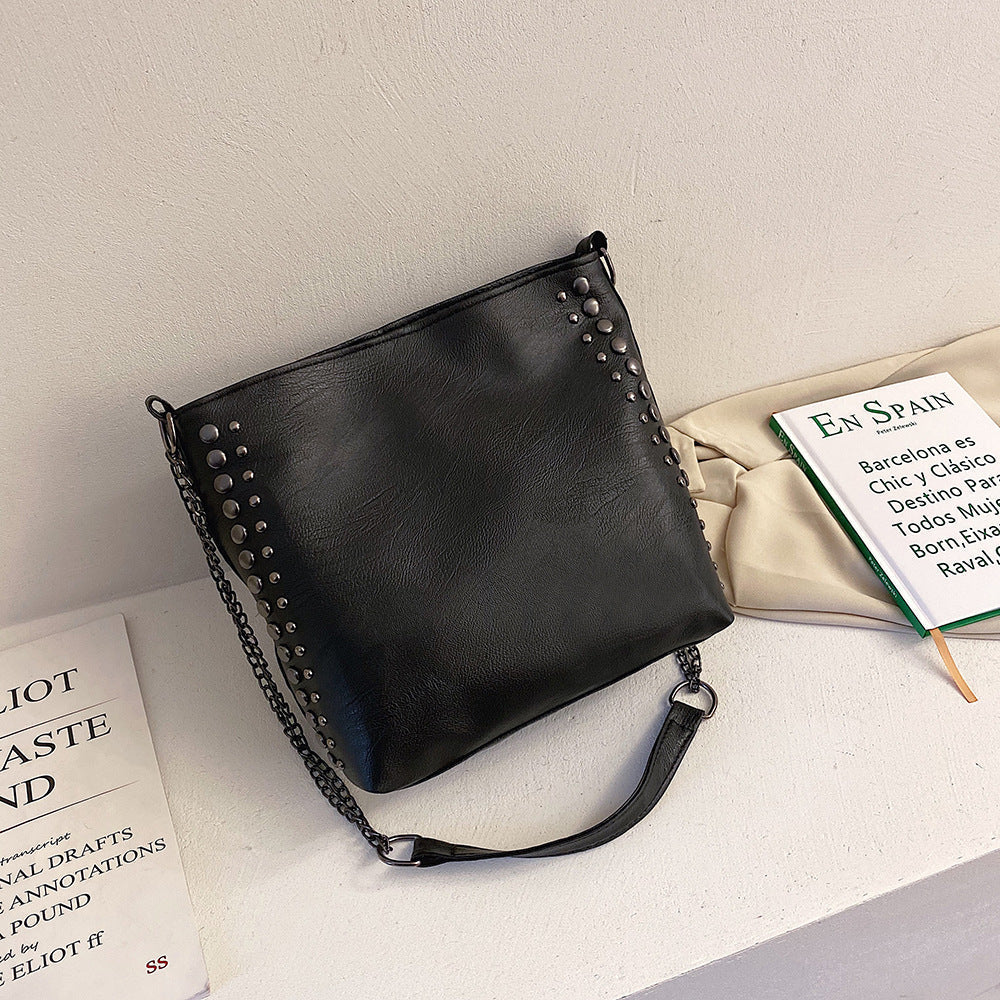 Winter new female bag retro style large capacity one-shoulder bucket bag soft leather rivet messenger bag mySite