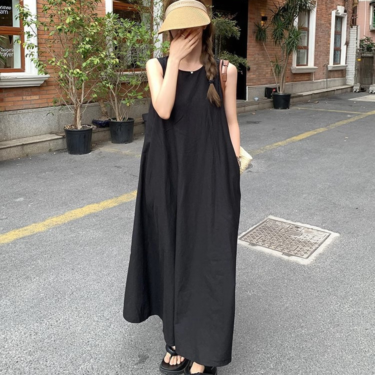 日韓設計感小眾寬鬆顯白露背度假風吊帶連身裙