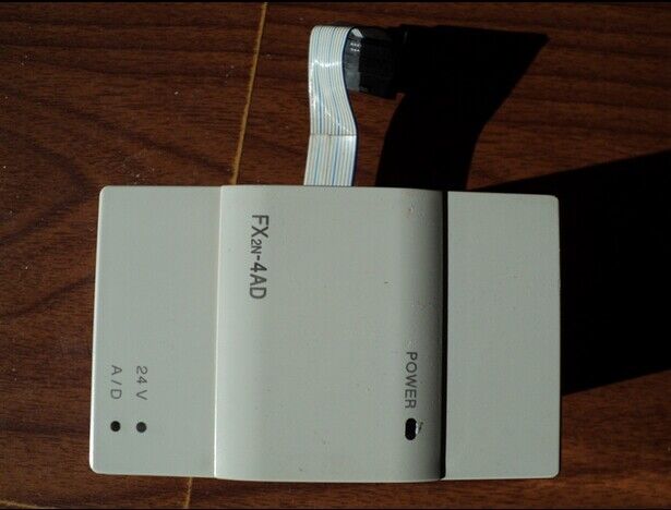 used-one-mitsubishi-fx2n-4ad-plc-module 0