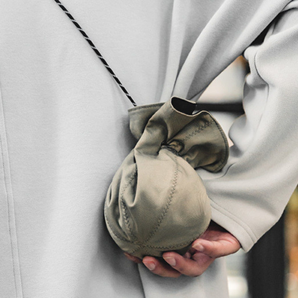 復古黑色兩用漁夫帽便攜手提零錢包錢袋帽遮陽帽子包