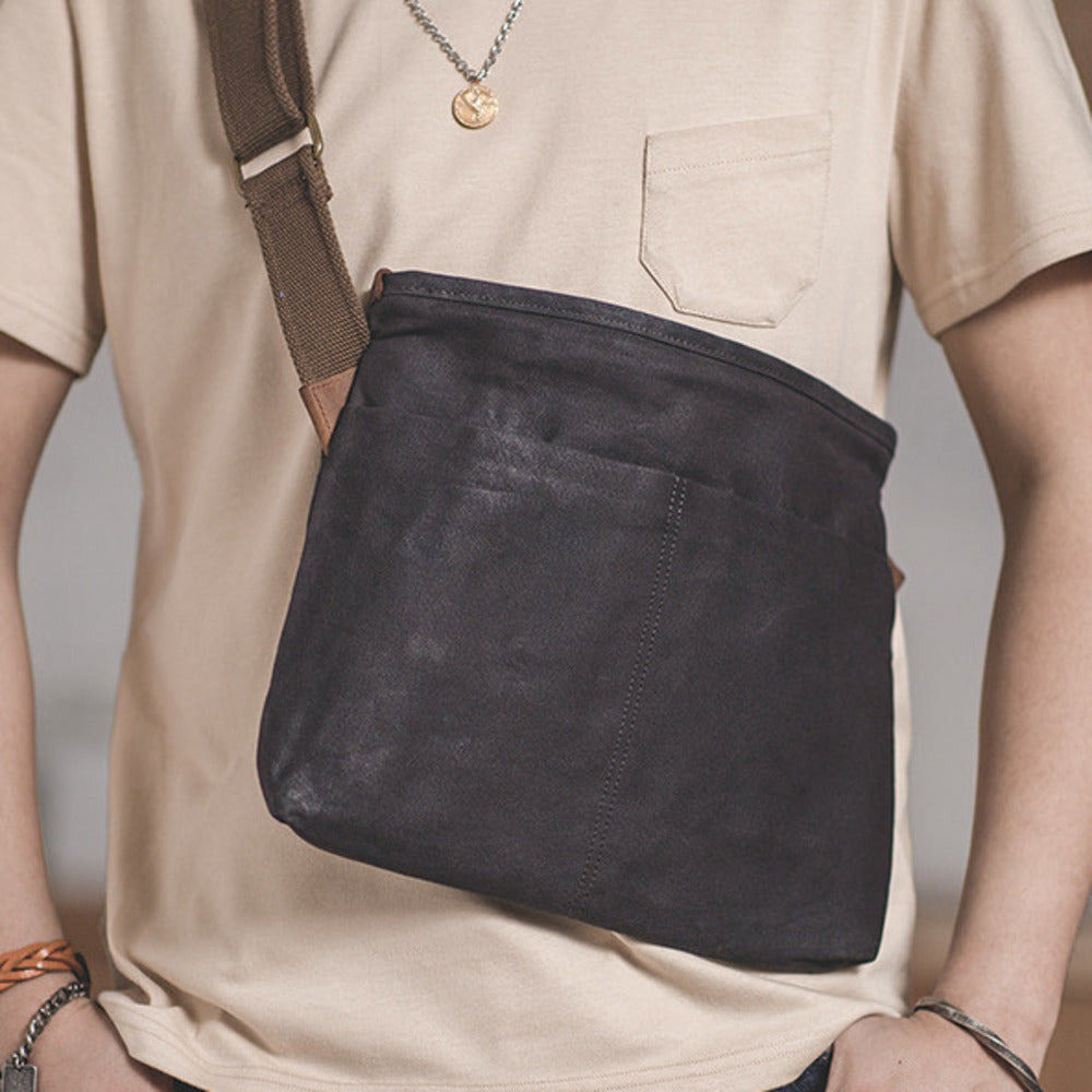 復古單肩通勤郵差耐磨做舊防水帆布包