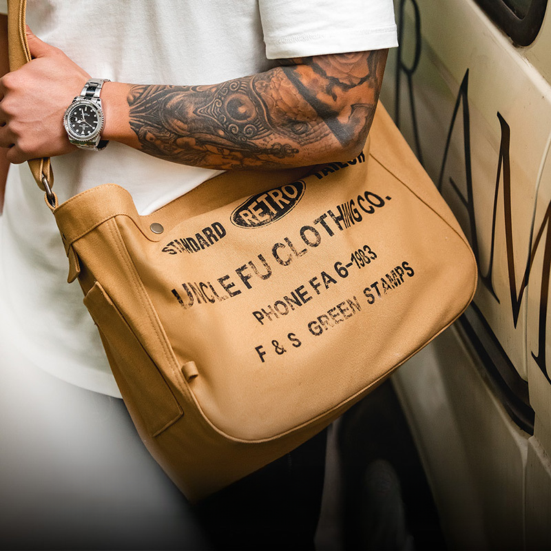 美式復古大容量斜挎報童包字母帆布機車電腦托特郵差包