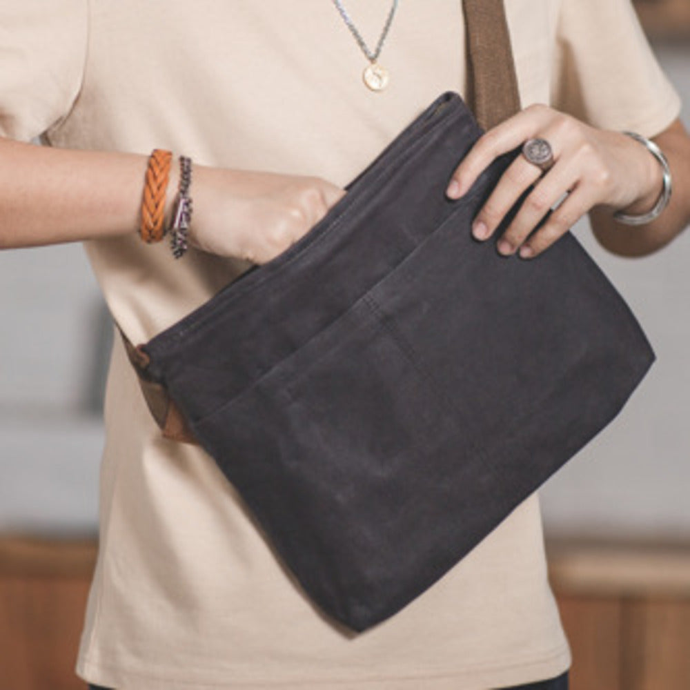 復古單肩通勤郵差耐磨做舊防水帆布包