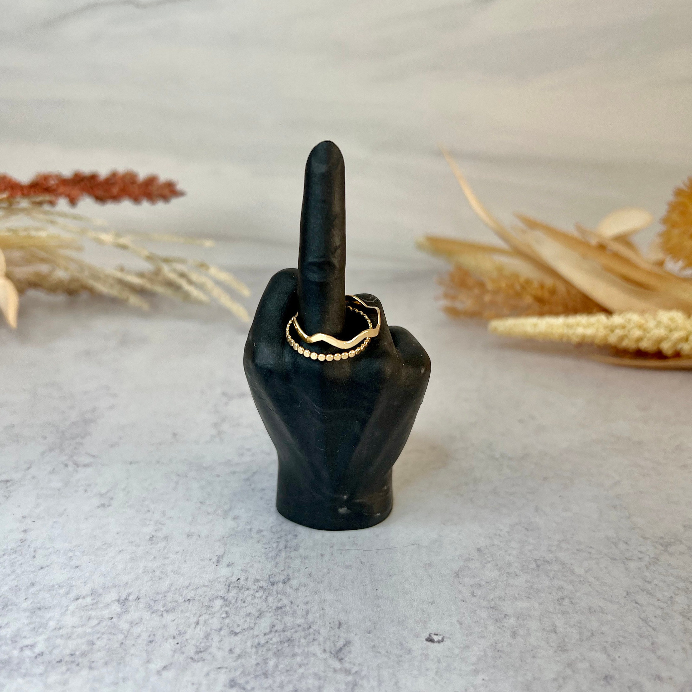 Middle Finger Ring Holer