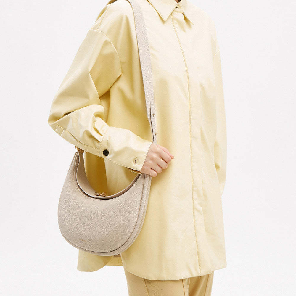 新款月彎包通勤月牙包單肩腋下包